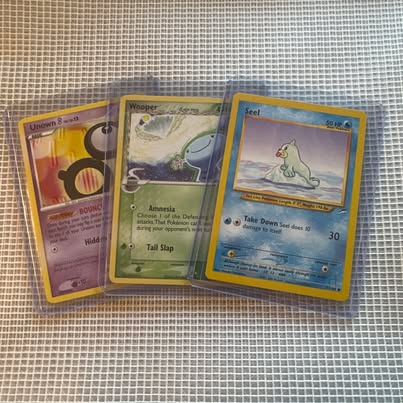 Photo of Vintage Pokémon 3-Card Lot — Wooper Delta, Unown B Reverse Holo, Seel (Played)