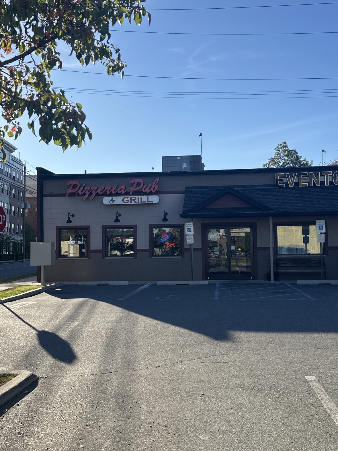 Ferraro's Pizzeria & Pub in Middlesex — the storefront on Lincoln Boulevard under a clear blue sky, with its red Pizzeria Pub & Grill sign