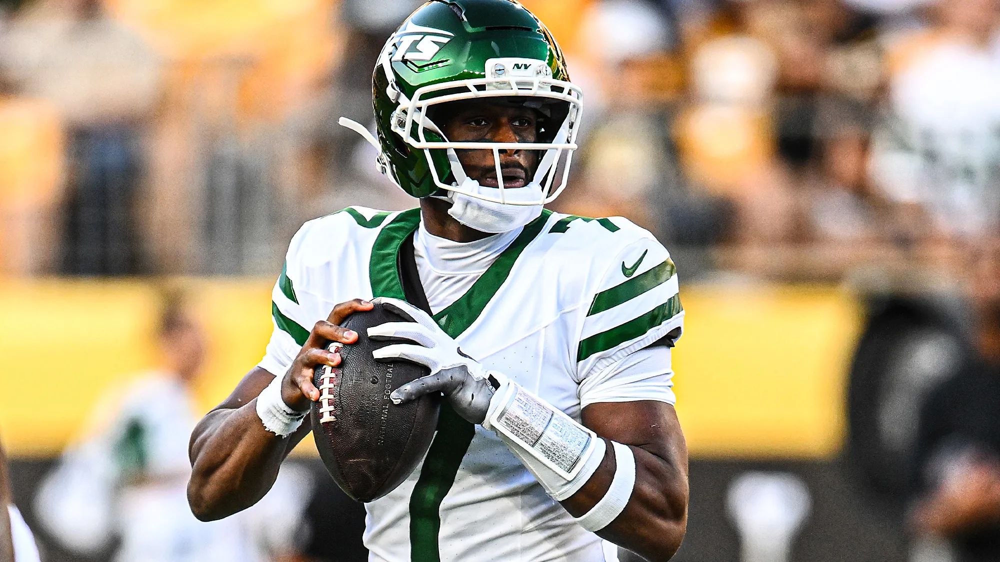 Geno Smith playing quarterback for the Jets